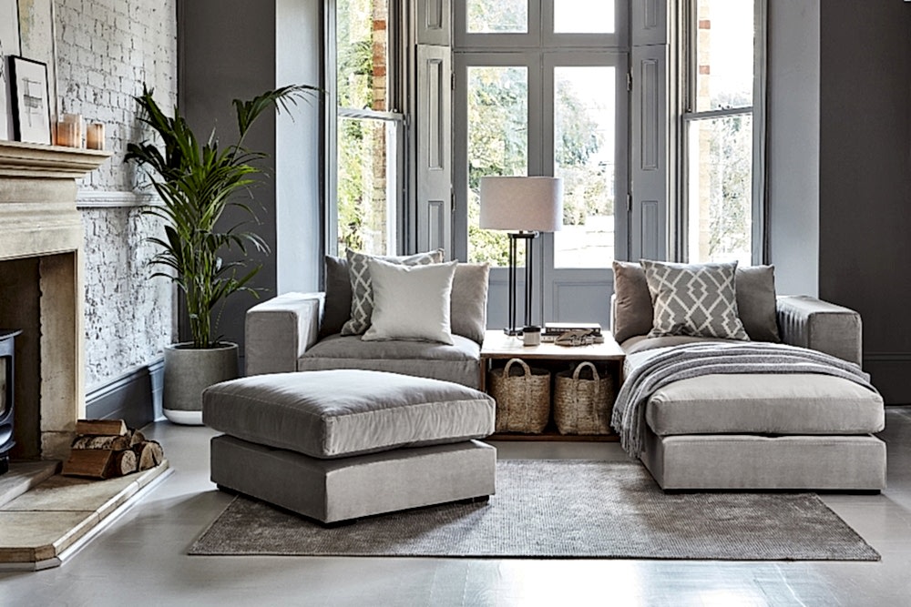 Modular sofa with teak storage cube in place of infill